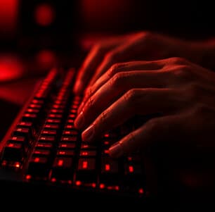 Close-up of a developer reviewing code